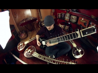 guy playing metal sitar