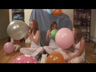 3 girls sexy happy in blow to pop balloons
