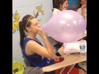 blowing up the biggest balloon in class